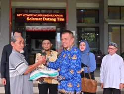 Arisal Aziz Salurkan Bantuan Beras dan Dorong Pemulihan